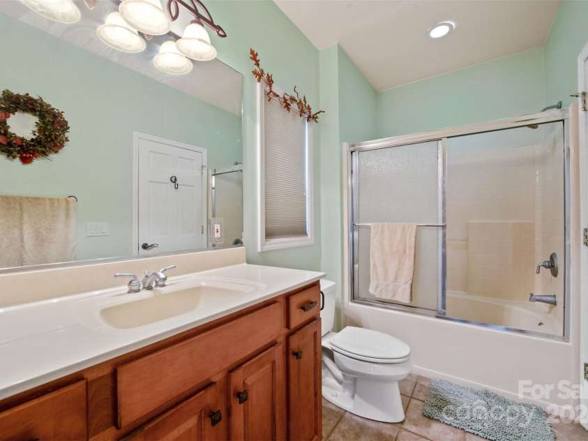 688 Olympic Drive, Whittier, NC 28789.  MLS# CAR4198933, YatesRealty ID 258. Guest Bathroom