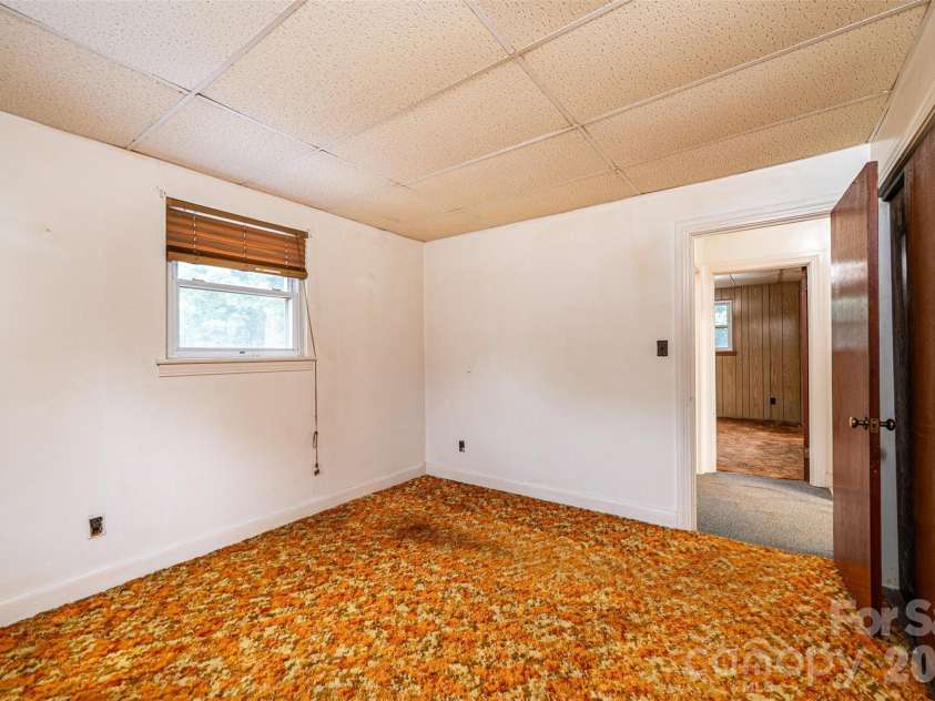 408 US Hwy 70A E Highway, Hildebran, NC 28637.  MLS# CAR4382969, YatesRealty ID 25800. Rear Bedroom