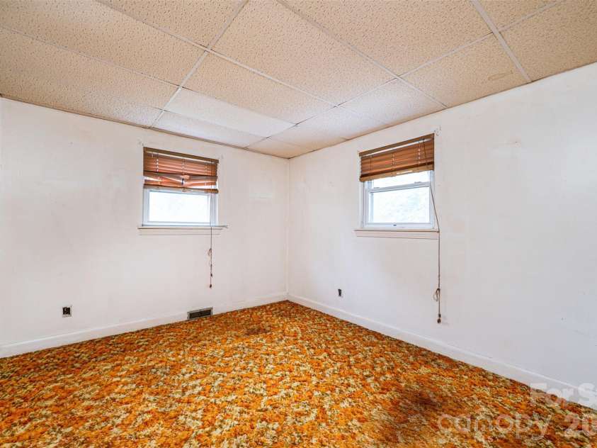 408 US Hwy 70A E Highway, Hildebran, NC 28637.  MLS# CAR4382969, YatesRealty ID 25800. Rear Bedroom