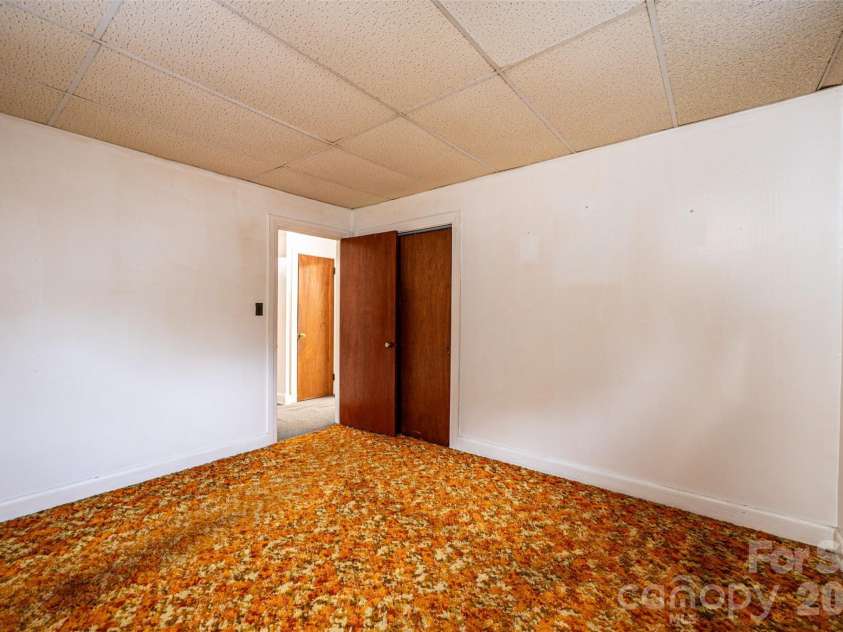 408 US Hwy 70A E Highway, Hildebran, NC 28637.  MLS# CAR4382969, YatesRealty ID 25800. Rear Bedroom