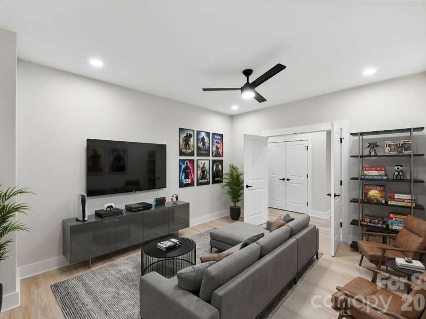 551 Perry Road, Troutman, NC 28166.  MLS# CAR4386907, YatesRealty ID 25803. Virtual Staged game room