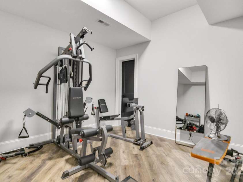 6327 Fox Tail Lane, Davidson, NC 28036.  MLS# CAR4271331, YatesRealty ID 25803. Flex room used as exercise room, with walk-in closet.