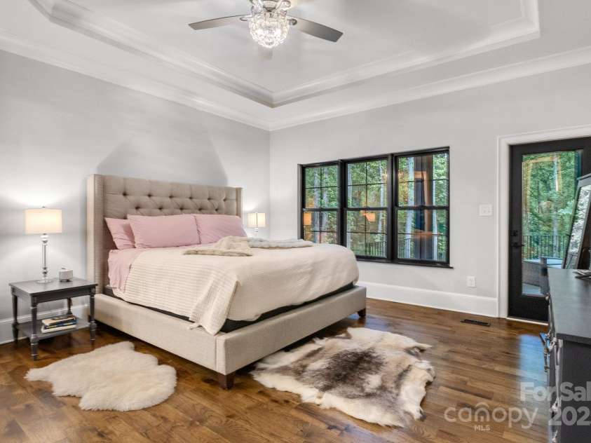 6327 Fox Tail Lane, Davidson, NC 28036.  MLS# CAR4271331, YatesRealty ID 25803. Primary bedroom offers access to the upper terrace.