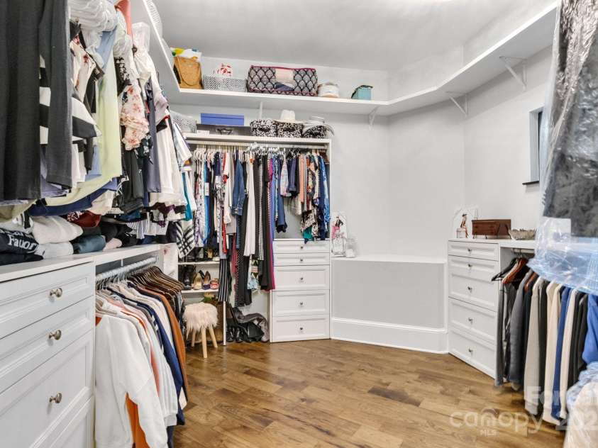 6327 Fox Tail Lane, Davidson, NC 28036.  MLS# CAR4271331, YatesRealty ID 25803. Primary closet provides ample hanging and storage space.