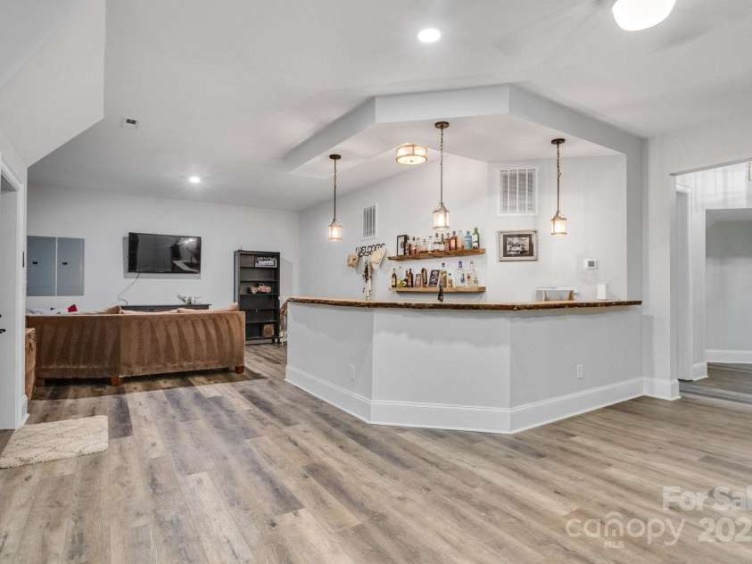 6327 Fox Tail Lane, Davidson, NC 28036.  MLS# CAR4271331, YatesRealty ID 25803. Rec room and wet bar provide lots of entertaining space.