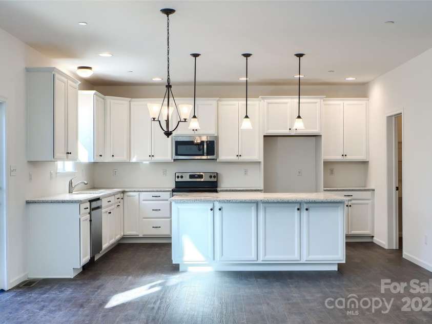 Lot 42 Watercourse Way, Belmont, NC 28012.  MLS# CAR4202838, YatesRealty ID 25809. Available to build