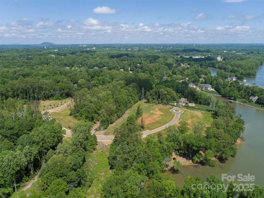 Lot 42 Watercourse Way, Belmont, NC 28012.  MLS# CAR4202838, YatesRealty ID 25809. Lakestone Cove community