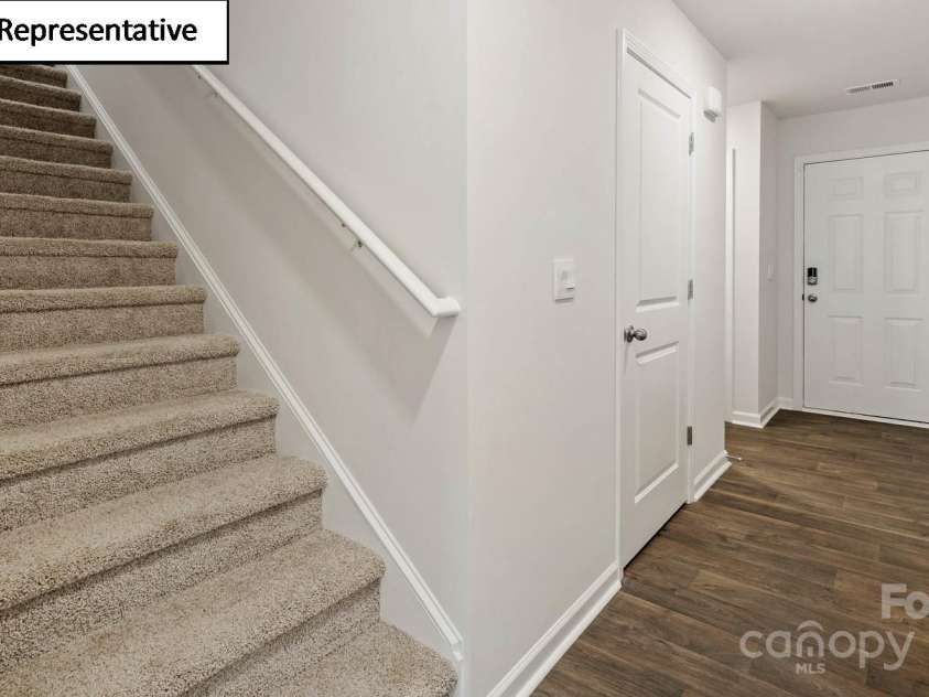 2953 Penninger Circle, Charlotte, NC 28262.  MLS# CAR4218929, YatesRealty ID 25817. Long foyer upon entry from front door