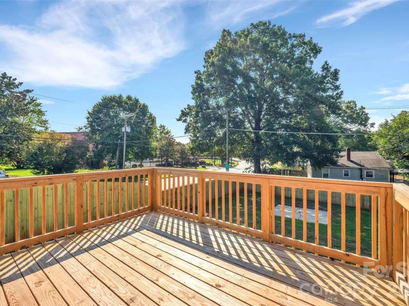 3942 Mcmillan Street, Charlotte, NC 28205.  MLS# CAR4410561, YatesRealty ID 2582. Brand New Deck