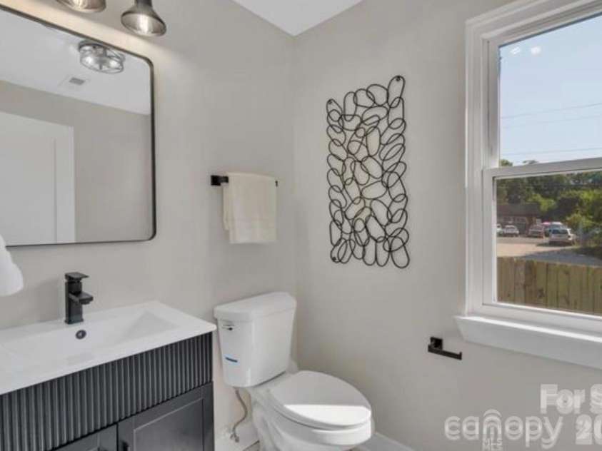 3942 Mcmillan Street, Charlotte, NC 28205.  MLS# CAR4410561, YatesRealty ID 2582. Half Bath