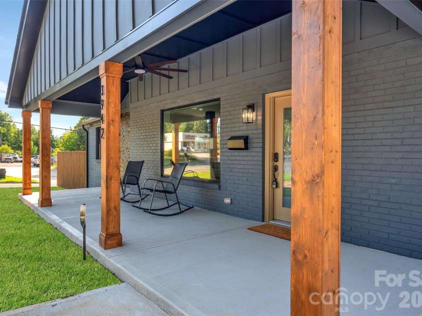 3942 Mcmillan Street, Charlotte, NC 28205.  MLS# CAR4410561, YatesRealty ID 2582. Large Front Porch with oversized fan
