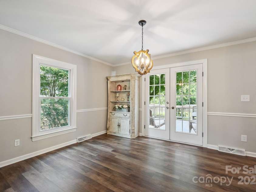 10206 Washam Potts Road, Cornelius, NC 28031.  MLS# CAR4273009, YatesRealty ID 25825. Dining Room which walks out to the backyard