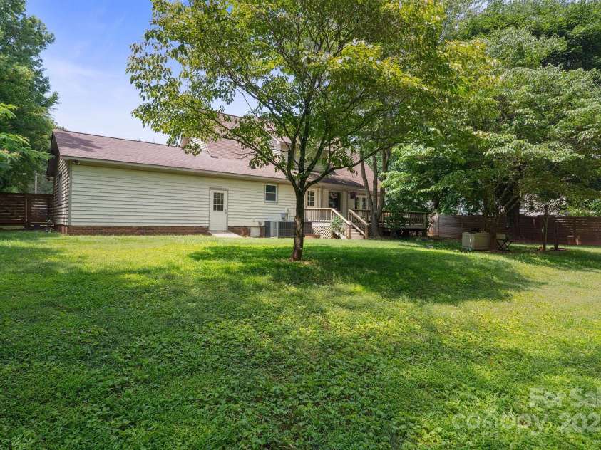 10206 Washam Potts Road, Cornelius, NC 28031.  MLS# CAR4273009, YatesRealty ID 25825. Expansive and Fenced Backyard