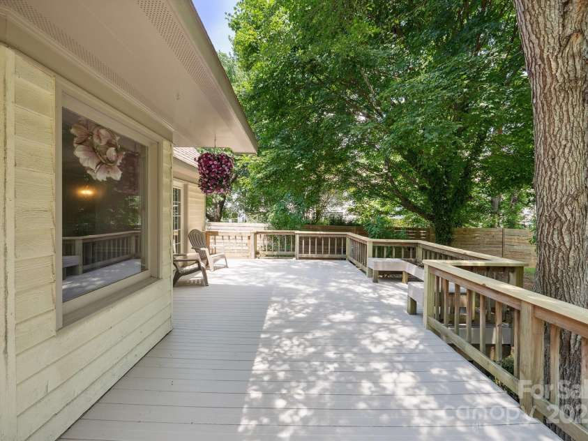 10206 Washam Potts Road, Cornelius, NC 28031.  MLS# CAR4273009, YatesRealty ID 25825. Spacious Deck in Expansive and Fenced Backyard