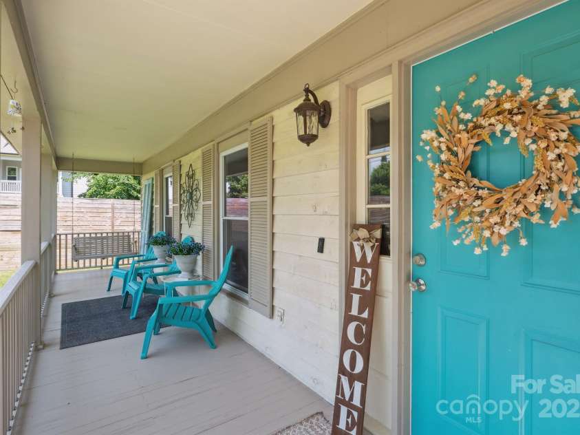 10206 Washam Potts Road, Cornelius, NC 28031.  MLS# CAR4273009, YatesRealty ID 25825. Welcoming front covered porch
