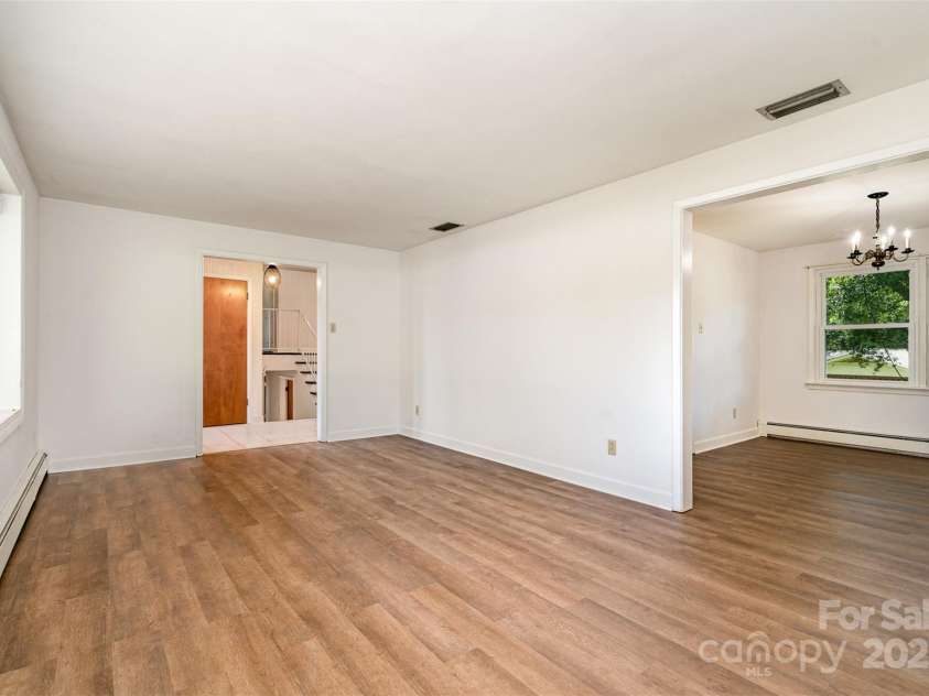 4250 Center Street, Hickory, NC 28601.  MLS# CAR4262798, YatesRealty ID 2583. Living Room into Dining Room