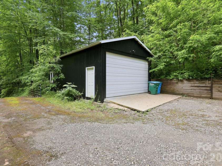 182 Saw Branch Road, Candler, NC 28715.  MLS# CAR4386375, YatesRealty ID 25834. 
