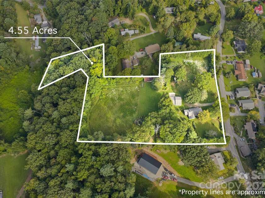 163 Pisgah View Road, Asheville, NC 28806.  MLS# CAR4294494, YatesRealty ID 2584. Amazing acreage with home just outside city limits!