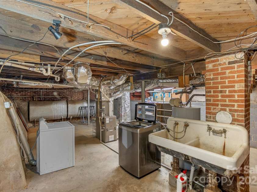 163 Pisgah View Road, Asheville, NC 28806.  MLS# CAR4294494, YatesRealty ID 2584. Basement