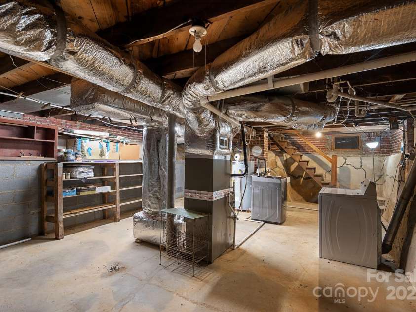 163 Pisgah View Road, Asheville, NC 28806.  MLS# CAR4294494, YatesRealty ID 2584. Basement