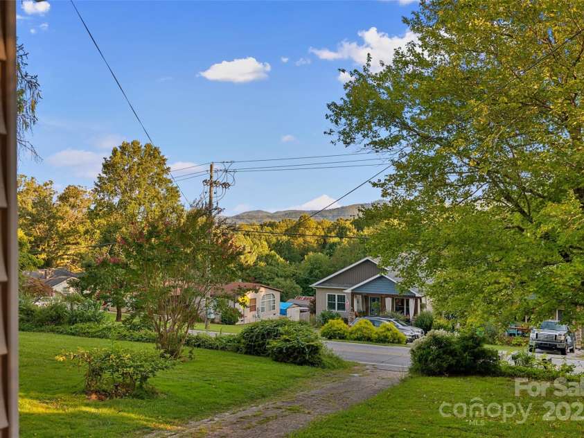 163 Pisgah View Road, Asheville, NC 28806.  MLS# CAR4294494, YatesRealty ID 2584. Mountain views from the front porch!