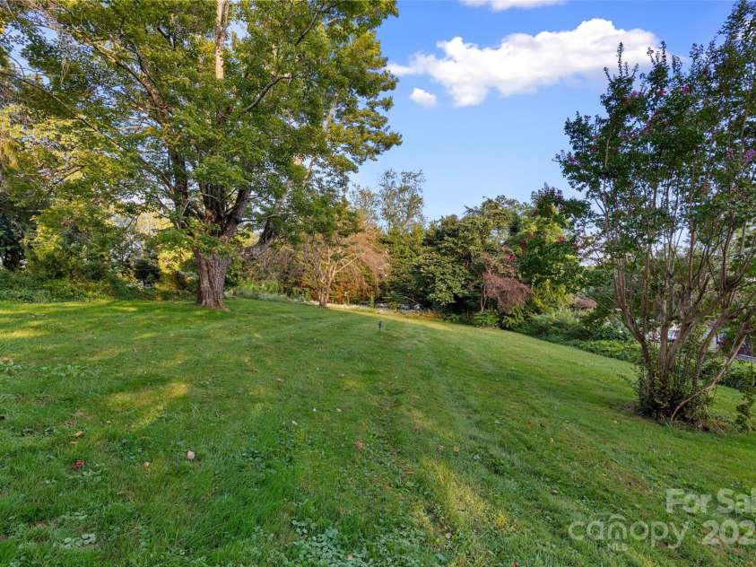 163 Pisgah View Road, Asheville, NC 28806.  MLS# CAR4294494, YatesRealty ID 2584. Plenty of room to play, build or garden!
