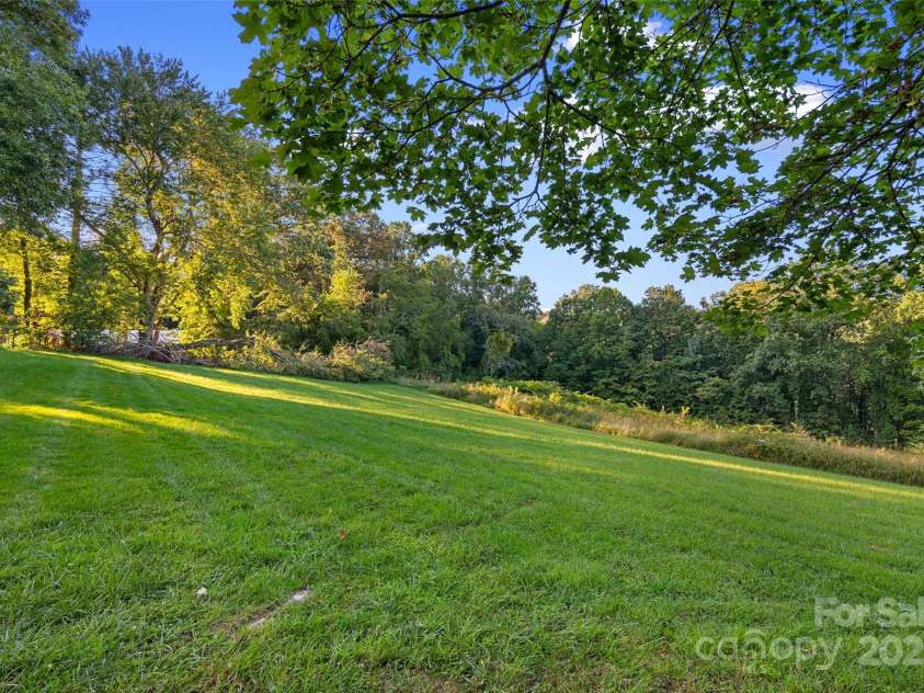 163 Pisgah View Road, Asheville, NC 28806.  MLS# CAR4294494, YatesRealty ID 2584. Plenty of room to play, build or garden!