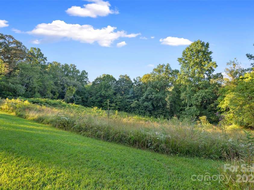 163 Pisgah View Road, Asheville, NC 28806.  MLS# CAR4294494, YatesRealty ID 2584. Plenty of room to play, build or garden!