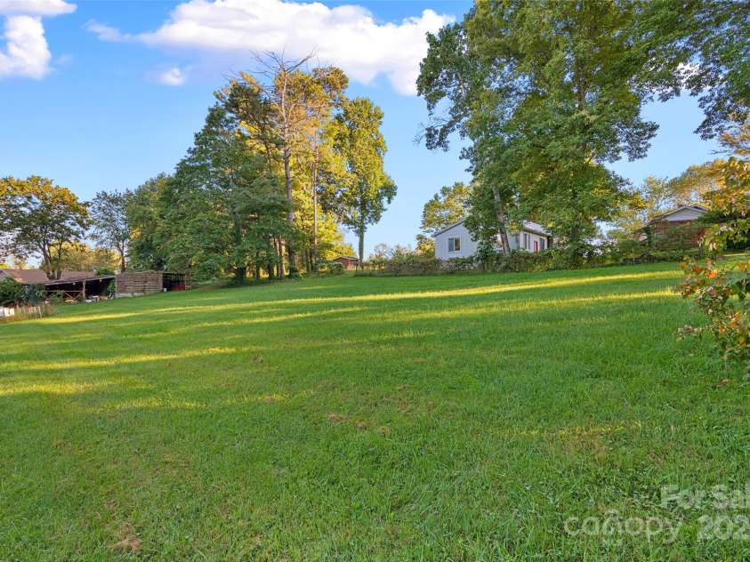 163 Pisgah View Road, Asheville, NC 28806.  MLS# CAR4294494, YatesRealty ID 2584. Plenty of room to play, build or garden!