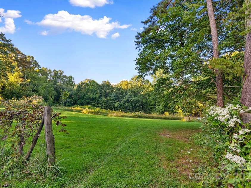 163 Pisgah View Road, Asheville, NC 28806.  MLS# CAR4294494, YatesRealty ID 2584. Plenty of room to play, build or garden!