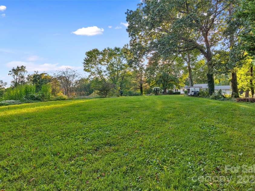 163 Pisgah View Road, Asheville, NC 28806.  MLS# CAR4294494, YatesRealty ID 2584. Plenty of room to play, build or garden!