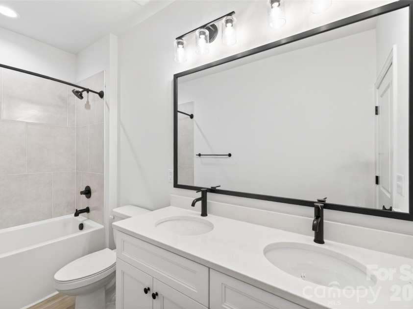 5400 Brickstone Drive, Charlotte, NC 28227.  MLS# CAR4377990, YatesRealty ID 25844. Guest Bathroom-Upper Level