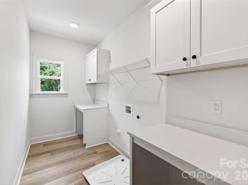 5400 Brickstone Drive, Charlotte, NC 28227.  MLS# CAR4377990, YatesRealty ID 25844. Laundry Room - Upper Level