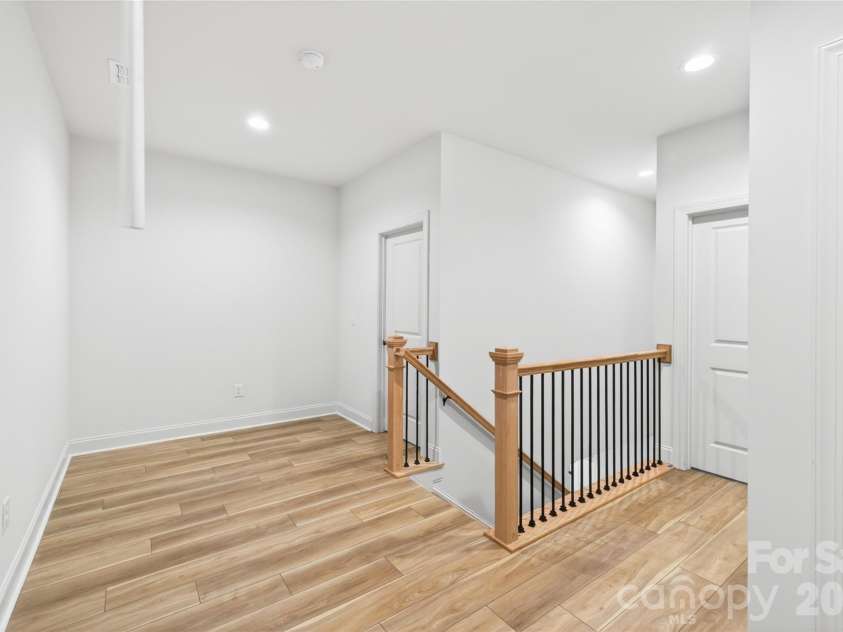 5400 Brickstone Drive, Charlotte, NC 28227.  MLS# CAR4377990, YatesRealty ID 25844. Upper Level Hallway