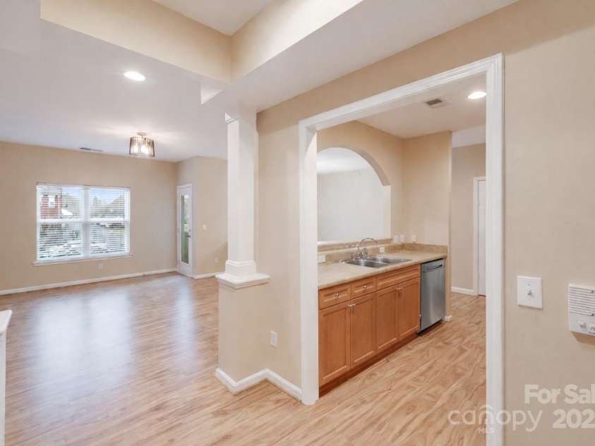 3805 Balsam Street, Indian Trail, NC 28079.  MLS# CAR4332385, YatesRealty ID 25847. Entryway looking into Family Room and kitchen