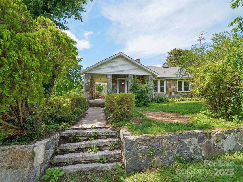 1207 Kanuga Road, Hendersonville, NC 28739.  MLS# CAR4278540, YatesRealty ID 25849. 