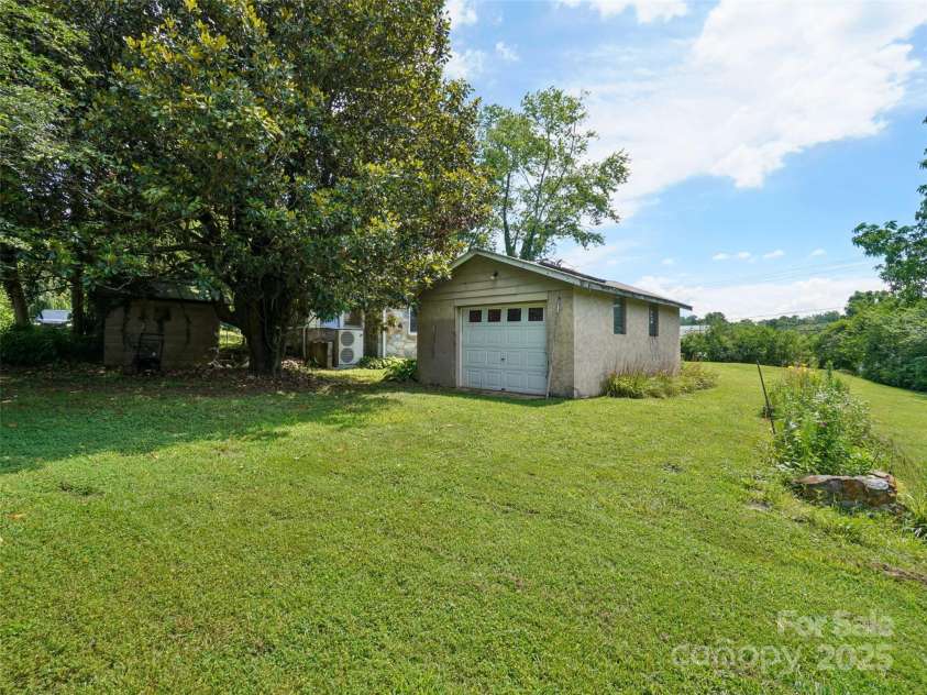 1207 Kanuga Road, Hendersonville, NC 28739.  MLS# CAR4278540, YatesRealty ID 25849. 