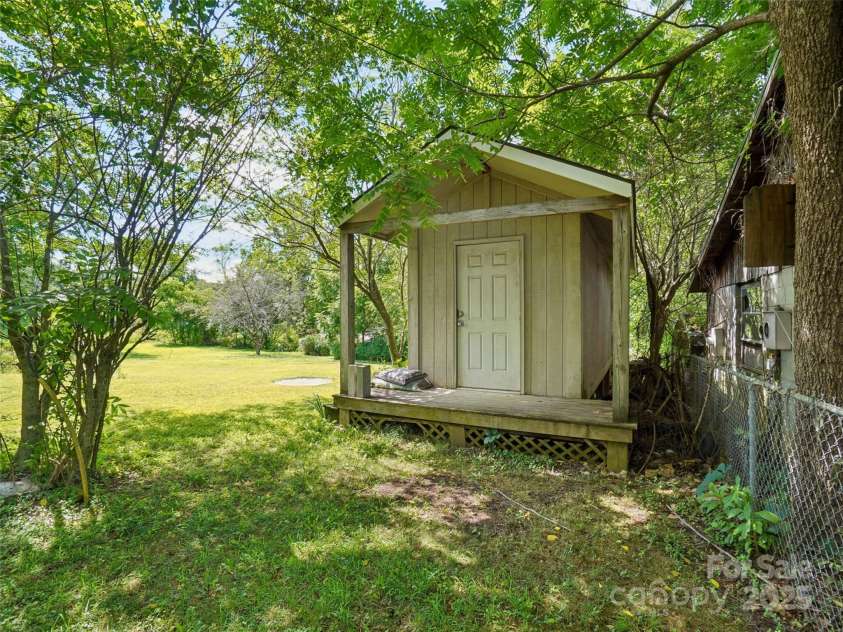 1207 Kanuga Road, Hendersonville, NC 28739.  MLS# CAR4278540, YatesRealty ID 25849. 