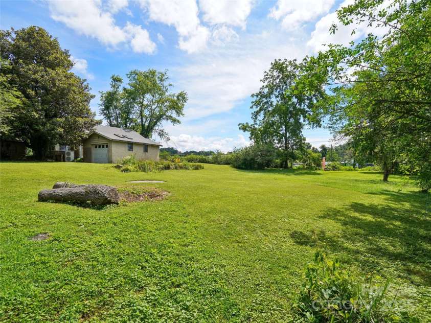 1207 Kanuga Road, Hendersonville, NC 28739.  MLS# CAR4278540, YatesRealty ID 25849. 