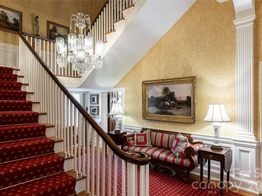 324 Vanderbilt Road, Asheville, NC 28803.  MLS# CAR4376732, YatesRealty ID 25849. Elegant staircase to second level