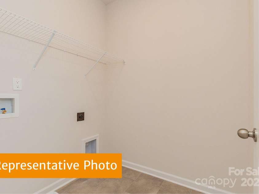 6041 Jasmine Branch Road, Charlotte, NC 28216.  MLS# CAR4333908, YatesRealty ID 2585. Suwanee Laundry Room