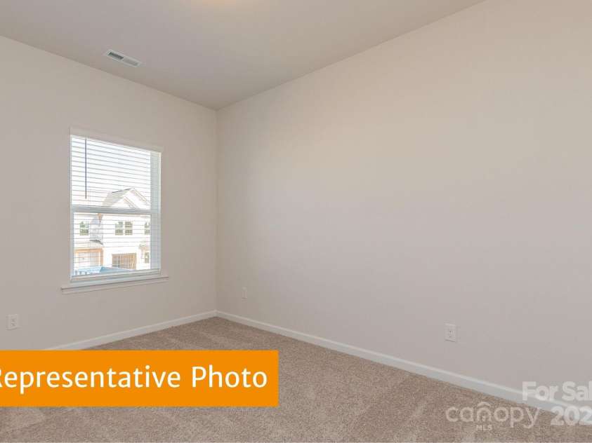 6041 Jasmine Branch Road, Charlotte, NC 28216.  MLS# CAR4333908, YatesRealty ID 2585. Suwanee Secondary Bedroom 1