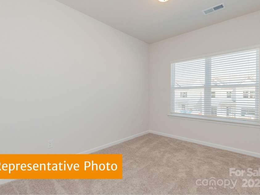 6041 Jasmine Branch Road, Charlotte, NC 28216.  MLS# CAR4333908, YatesRealty ID 2585. Suwanee Secondary Bedroom 2