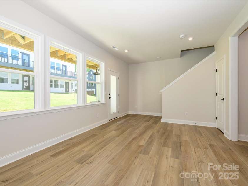 816 Flintside Lane, Charlotte, NC 28217.  MLS# CAR4278457, YatesRealty ID 25853. First Floor Flex Space Creates Ideal Secondary Living Space and Leads to Outdoor Living.