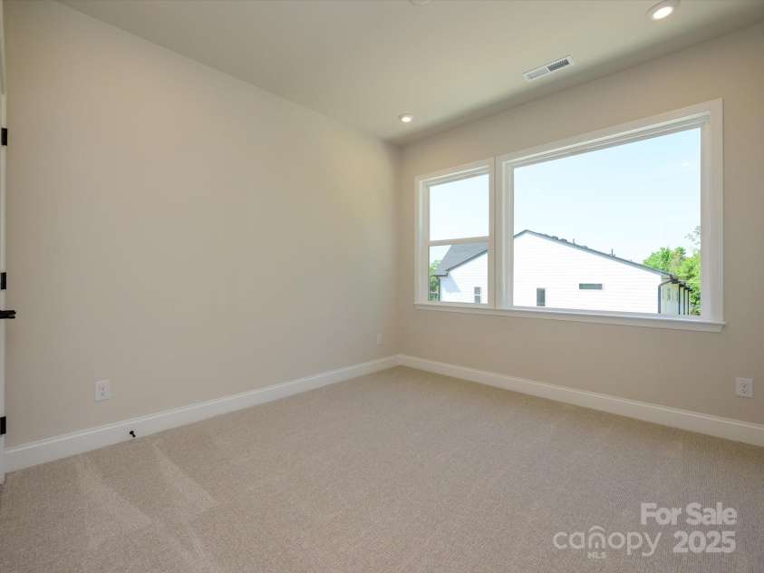 816 Flintside Lane, Charlotte, NC 28217.  MLS# CAR4278457, YatesRealty ID 25853. Secondary Bedroom.