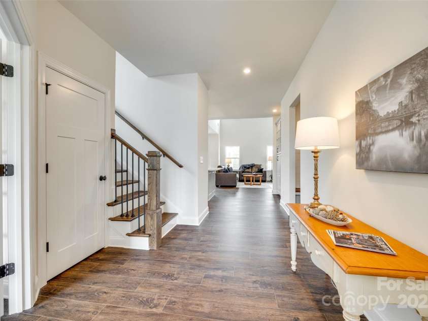 18011 Wilbanks Drive, Charlotte, NC 28278.  MLS# CAR4256574, YatesRealty ID 25857. Bright and spacious hallway with stylish finishes and a view into the heart of the home.