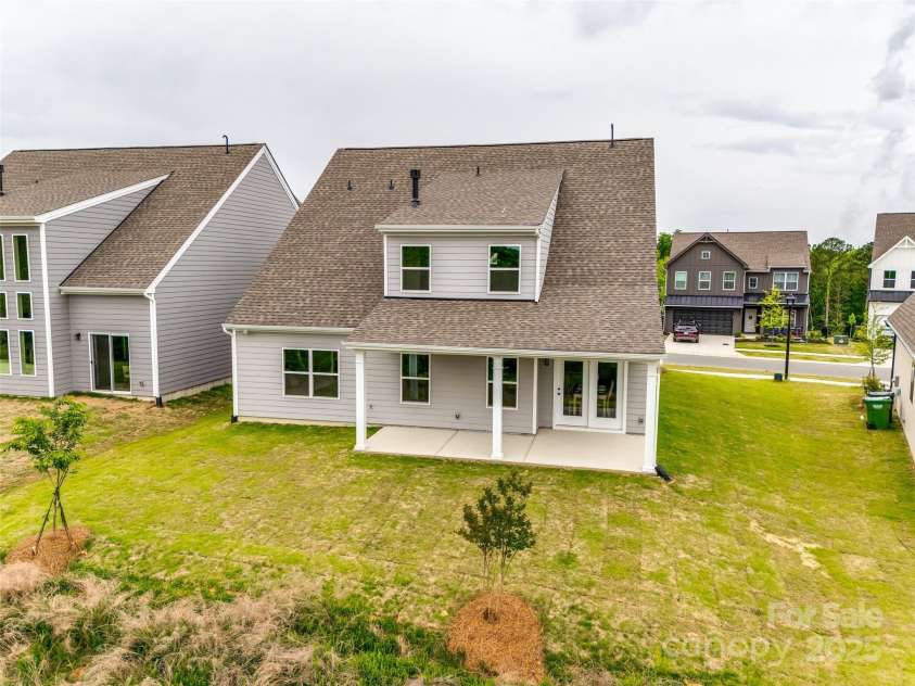 18011 Wilbanks Drive, Charlotte, NC 28278.  MLS# CAR4256574, YatesRealty ID 25857. Charming rear view with covered porch and fenced-in potential.