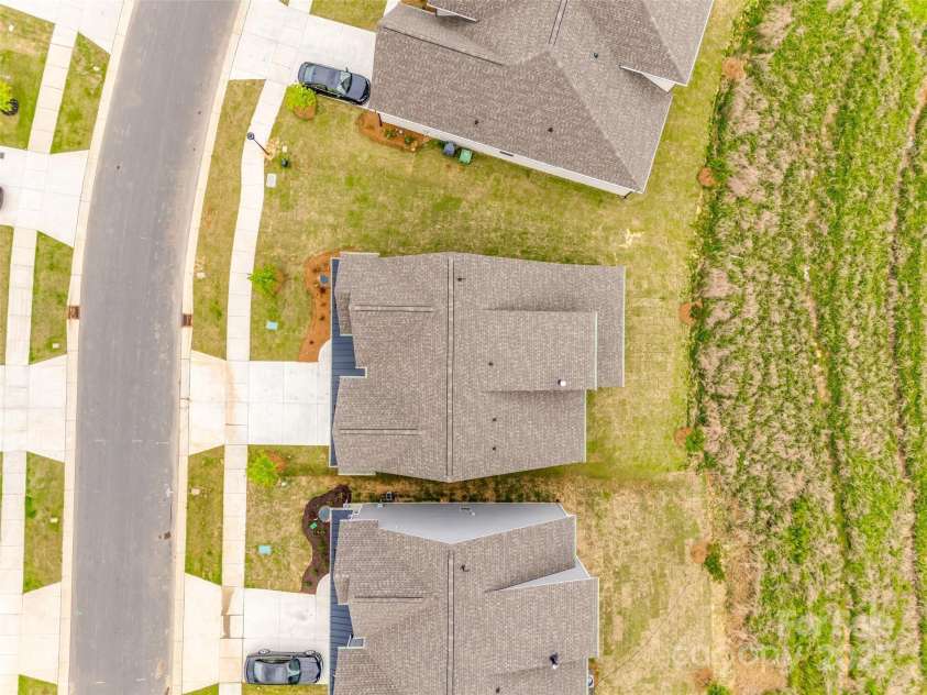 18011 Wilbanks Drive, Charlotte, NC 28278.  MLS# CAR4256574, YatesRealty ID 25857. Green space behind for added privacy.