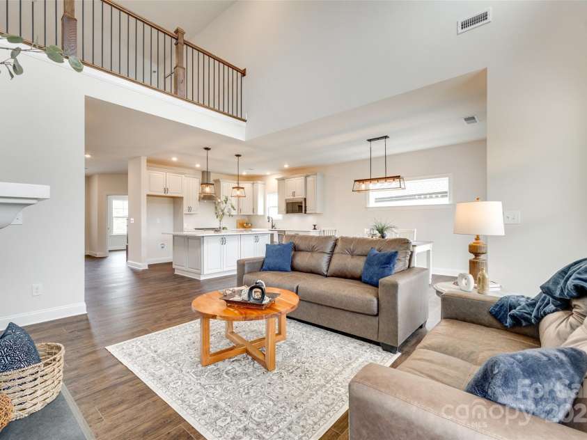 18011 Wilbanks Drive, Charlotte, NC 28278.  MLS# CAR4256574, YatesRealty ID 25857. Jaw-dropping two-story great room with sunlight, style, and serious wow factor—this is the one you’ve been waiting for!