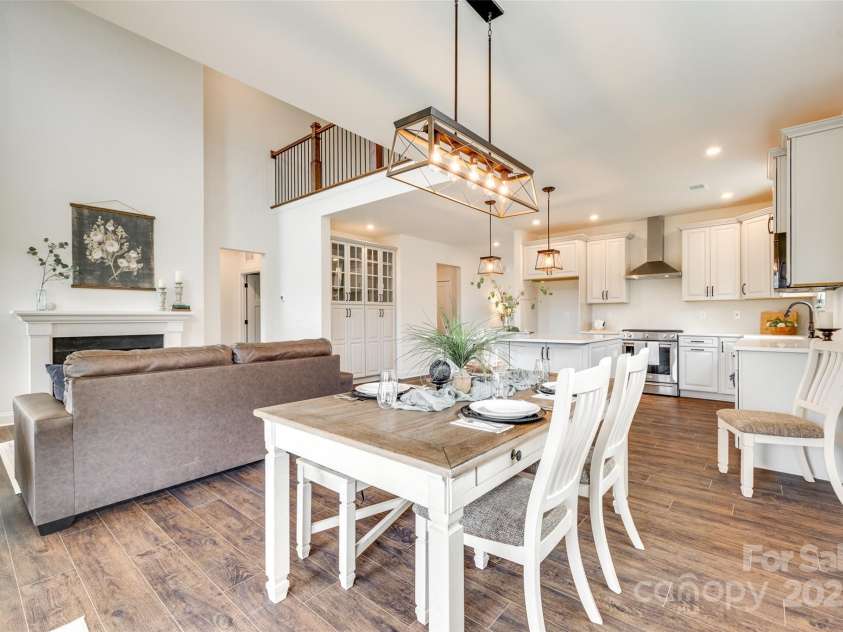 18011 Wilbanks Drive, Charlotte, NC 28278.  MLS# CAR4256574, YatesRealty ID 25857. Spacious open-concept living, dining, and kitchen for effortless entertaining.